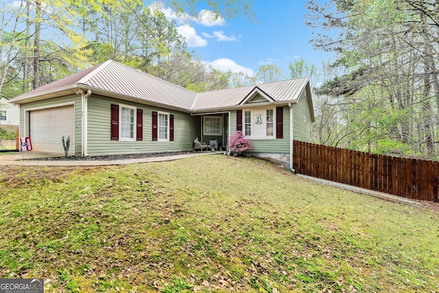 95 Joshua Ct, Zebulon, GA 30295 - ranch-style home with a metal roof, driveway, and a garage