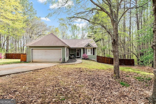 95 Joshua Ct, Zebulon, GA 30295 - single story home with an attached garage, a metal roof, and concrete driveway