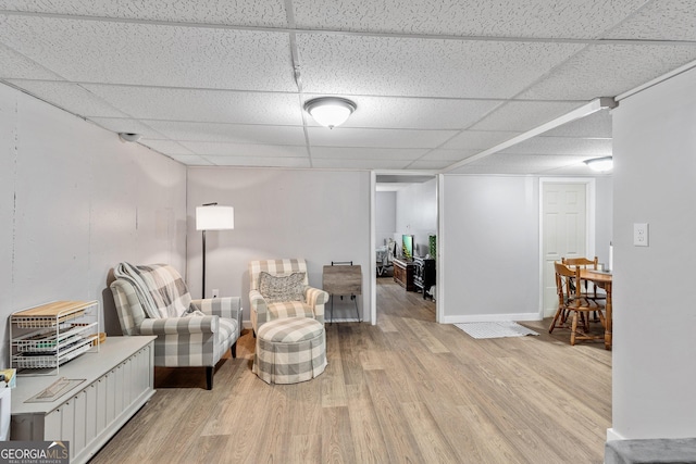 95 Joshua Ct, Zebulon, GA 30295 - living area with a drop ceiling and light wood-style floors