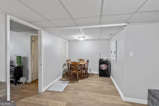 95 Joshua Ct, Zebulon, GA 30295 - dining area with a drop ceiling and light wood-style flooring