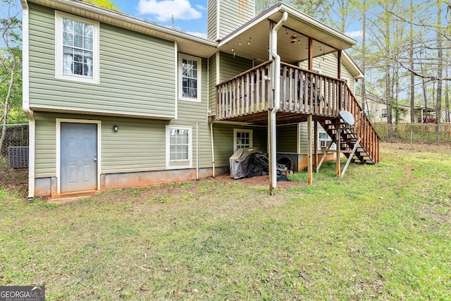 95 Joshua Ct, Zebulon, GA 30295 - rear view of house with stairs, a deck, and a chimney