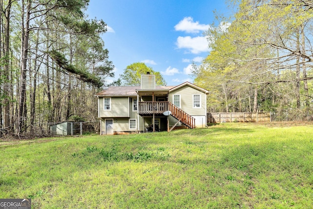 95 Joshua Ct, Zebulon, GA 30295 - rear view of property with stairs, a chimney, a deck, and a metal roof