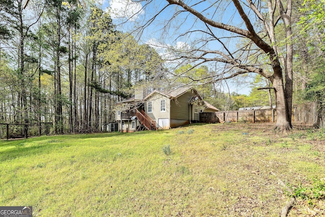95 Joshua Ct, Zebulon, GA 30295 - view of yard featuring stairs and a wooden deck