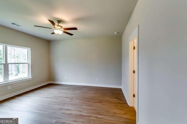 497 Principal Meridian Dr, Dallas, GA 30132 - unfurnished room featuring a ceiling fan, wood finished floors, and baseboards