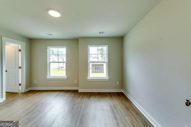 497 Principal Meridian Dr, Dallas, GA 30132 - unfurnished room featuring wood finished floors and baseboards