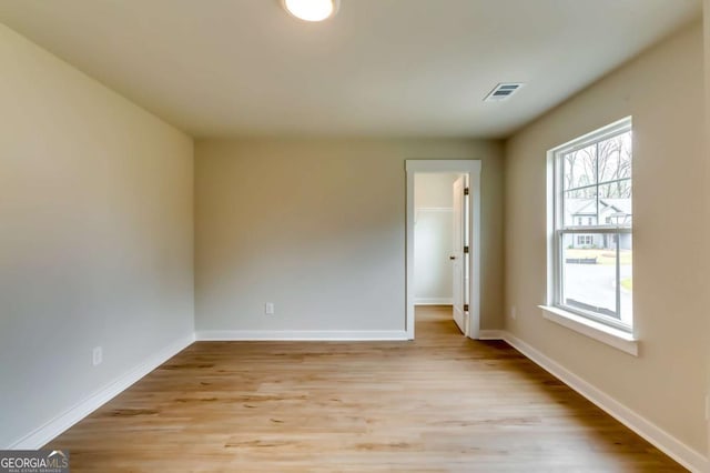 497 Principal Meridian Dr, Dallas, GA 30132 - spare room with light wood-type flooring and baseboards
