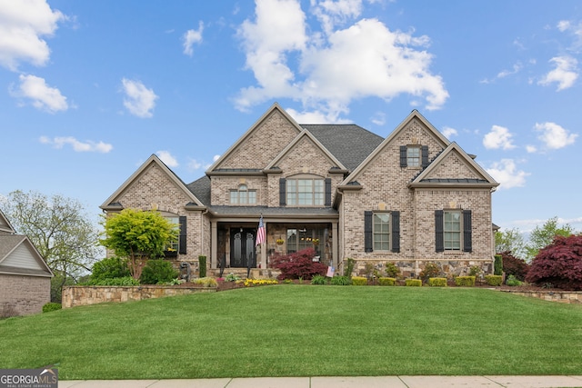 968 Woodtrace Ln, Auburn, GA 30011 - craftsman-style house featuring a shingled roof, a front yard, and brick siding