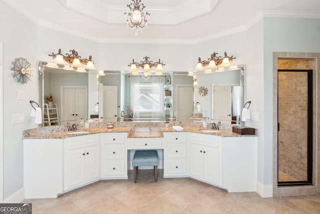 968 Woodtrace Ln, Auburn, GA 30011 - bathroom with a sink, tile patterned flooring, an inviting chandelier, and a stall shower