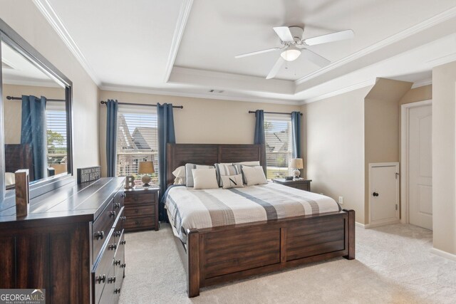 968 Woodtrace Ln, Auburn, GA 30011 - bedroom with crown molding, a tray ceiling, ceiling fan, and light carpet