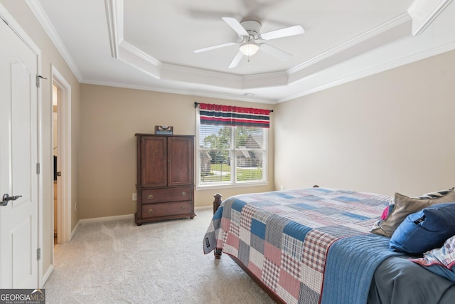 968 Woodtrace Ln, Auburn, GA 30011 - bedroom with baseboards, a tray ceiling, light colored carpet, and crown molding