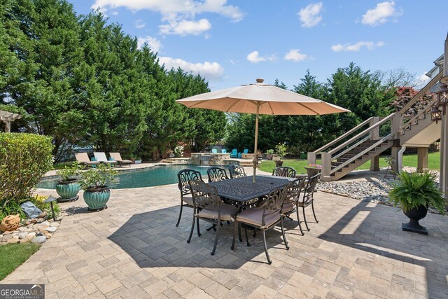 968 Woodtrace Ln, Auburn, GA 30011 - view of patio / terrace featuring an outdoor pool, outdoor dining area, and stairs