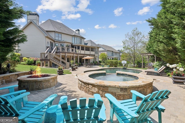 968 Woodtrace Ln, Auburn, GA 30011 - view of swimming pool featuring an outdoor fire pit, a patio area, a pergola, and stairway