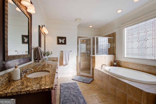 full bath with a bath, crown molding, vanity, a stall shower, and tile patterned flooring