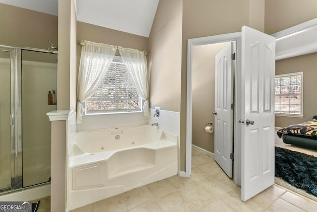 79 Tiffany Trce, Palmetto, GA 30268 - bathroom with a shower stall, baseboards, lofted ceiling, and a jetted tub