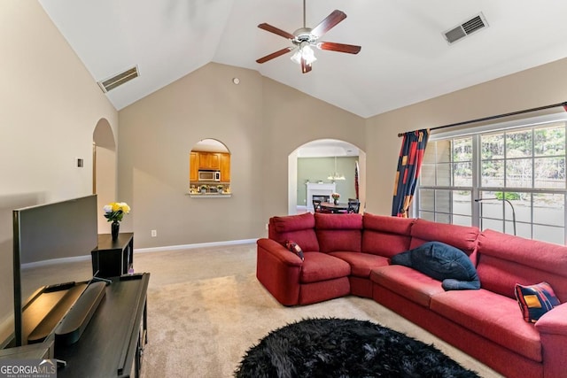 79 Tiffany Trce, Palmetto, GA 30268 - carpeted living area with visible vents, arched walkways, and a ceiling fan