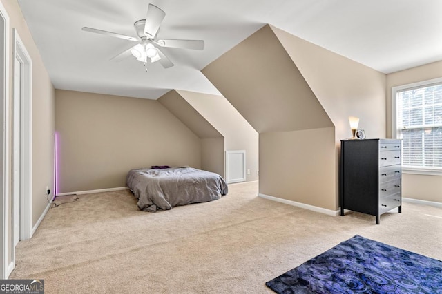 79 Tiffany Trce, Palmetto, GA 30268 - bedroom with a ceiling fan, light carpet, baseboards, and lofted ceiling