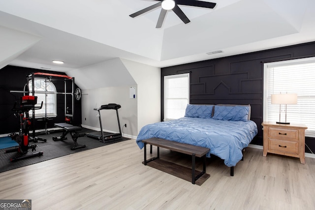 4215 Steeplehill Dr NW, Kennesaw, GA 30144 - bedroom with vaulted ceiling, light wood finished floors, and ceiling fan