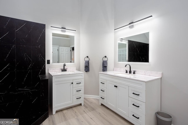 4215 Steeplehill Dr NW, Kennesaw, GA 30144 - full bath with two vanities and wood finished floors