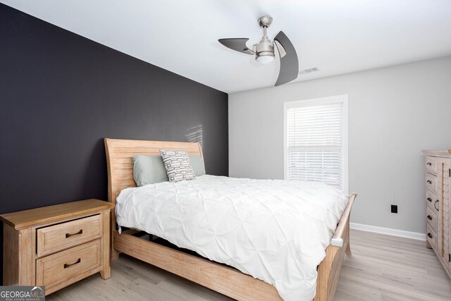 4215 Steeplehill Dr NW, Kennesaw, GA 30144 - bedroom featuring light wood finished floors and ceiling fan