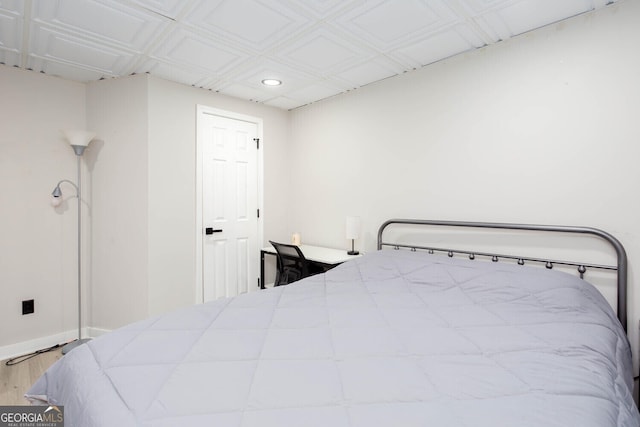 4215 Steeplehill Dr NW, Kennesaw, GA 30144 - bedroom featuring wood finished floors and recessed lighting