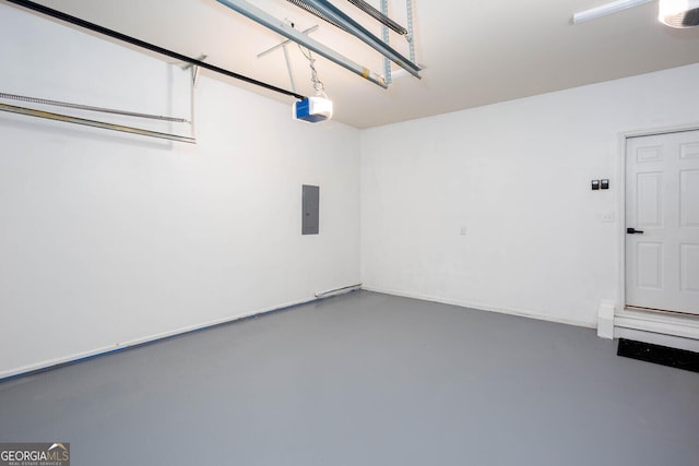 4215 Steeplehill Dr NW, Kennesaw, GA 30144 - garage featuring a garage door opener and electric panel