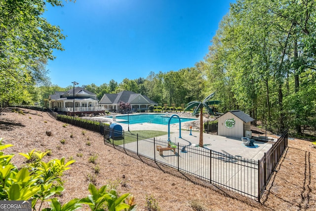 4215 Steeplehill Dr NW, Kennesaw, GA 30144 - community pool featuring a patio area