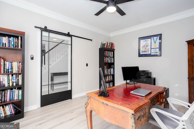 4215 Steeplehill Dr NW, Kennesaw, GA 30144 - home office with wood finished floors, ceiling fan, ornamental molding, and a barn door