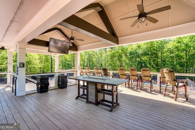 4215 Steeplehill Dr NW, Kennesaw, GA 30144 - wooden deck featuring ceiling fan, outdoor dining space, a gazebo, and view of wooded area