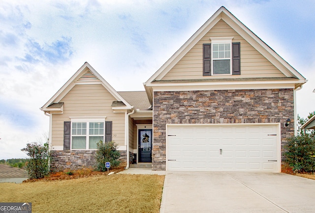 32 October Ave, Newnan, GA 30265 - craftsman-style home featuring stone siding, driveway, and a front lawn