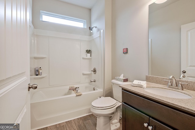32 October Ave, Newnan, GA 30265 - full bath featuring shower / tub combination, vanity, wood finished floors, and toilet
