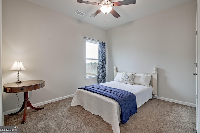 32 October Ave, Newnan, GA 30265 - carpeted bedroom with baseboards and a ceiling fan