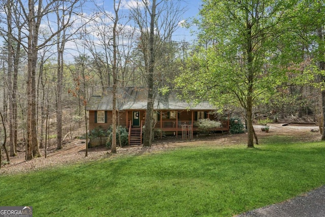 single story home featuring a front yard and covered porch