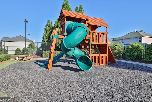 community jungle gym with fence
