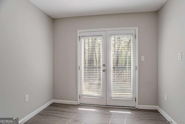 477 Victoria Rd, Woodstock, GA 30189 - entryway with french doors and wood finished floors
