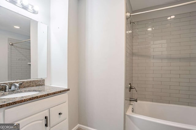 477 Victoria Rd, Woodstock, GA 30189 - full bathroom with vanity, washtub / shower combination, and recessed lighting