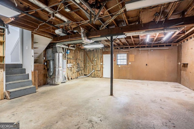 477 Victoria Rd, Woodstock, GA 30189 - basement featuring gas water heater, stairway, and heating unit