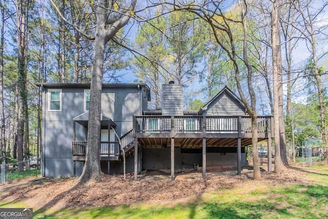 477 Victoria Rd, Woodstock, GA 30189 - back of property featuring a deck and a chimney