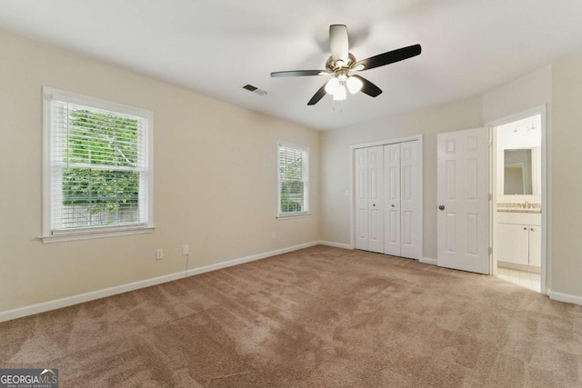 11925 N Hickory Trce, Alpharetta, GA 30004 - unfurnished bedroom featuring a closet, carpet flooring, visible vents, baseboards, and ceiling fan