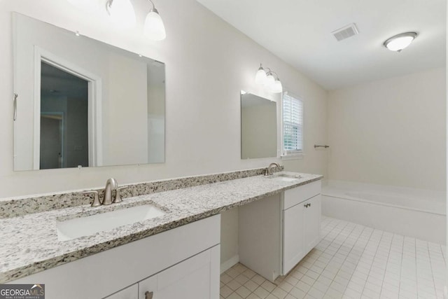 11925 N Hickory Trce, Alpharetta, GA 30004 - bathroom featuring double vanity, a sink, tile patterned floors, and visible vents