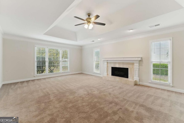 11925 N Hickory Trce, Alpharetta, GA 30004 - unfurnished living room featuring carpet floors, ornamental molding, a tray ceiling, and baseboards