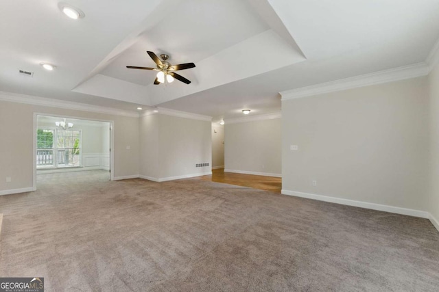 11925 N Hickory Trce, Alpharetta, GA 30004 - carpeted spare room featuring a raised ceiling, ceiling fan with notable chandelier, baseboards, and visible vents