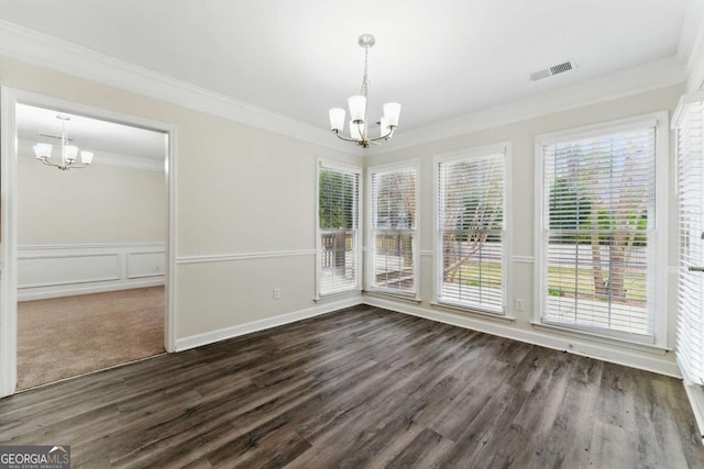 11925 N Hickory Trce, Alpharetta, GA 30004 - unfurnished dining area featuring visible vents, crown molding, dark wood-type flooring, and an inviting chandelier
