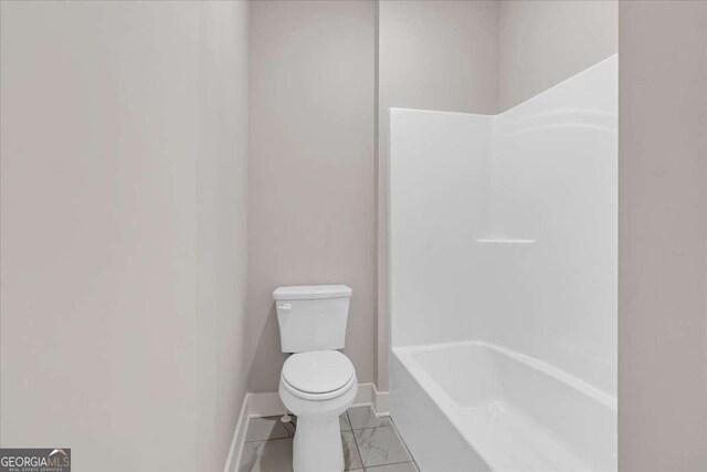 4444 Sullivan Rd, Powder Springs, GA 30127 - full bathroom with a shower, a bathtub, baseboards, toilet, and tile patterned floors
