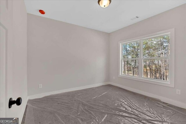 4444 Sullivan Rd, Powder Springs, GA 30127 - empty room with baseboards and visible vents