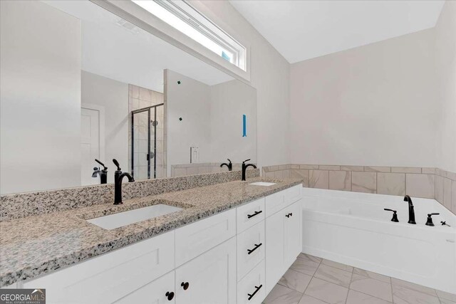 4444 Sullivan Rd, Powder Springs, GA 30127 - bathroom featuring a bath, marble finish floor, a sink, and a stall shower