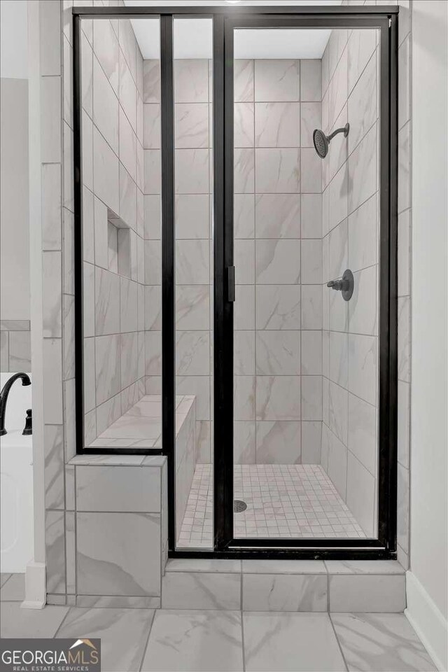 4444 Sullivan Rd, Powder Springs, GA 30127 - bathroom featuring marble finish floor and a shower stall