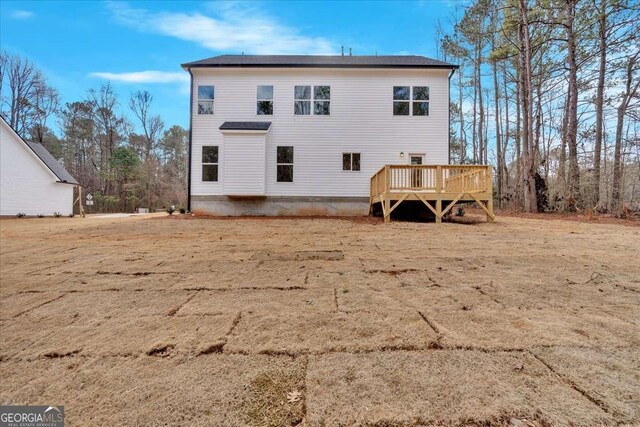 4444 Sullivan Rd, Powder Springs, GA 30127 - back of property with a deck