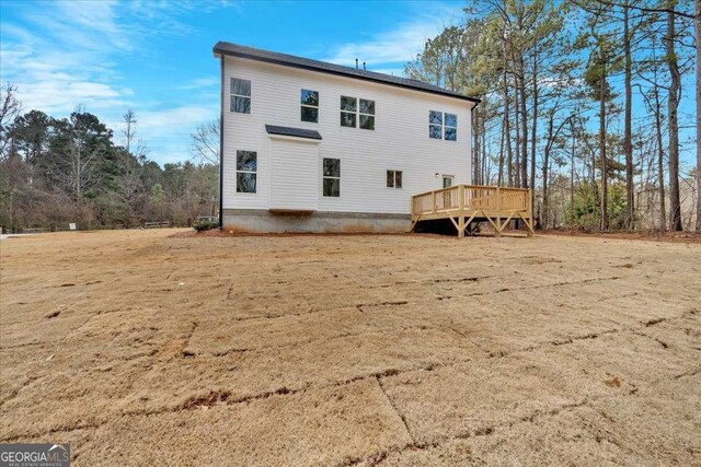 4444 Sullivan Rd, Powder Springs, GA 30127 - back of property featuring a wooden deck