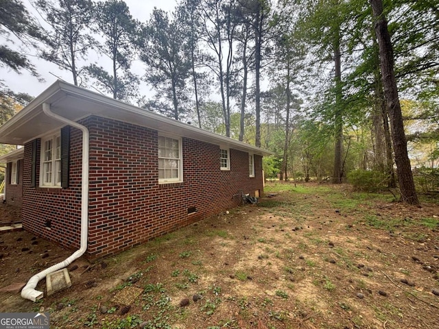 3488 Richmond Dr SE, Conyers, GA 30094 - view of side of home with brick siding and crawl space