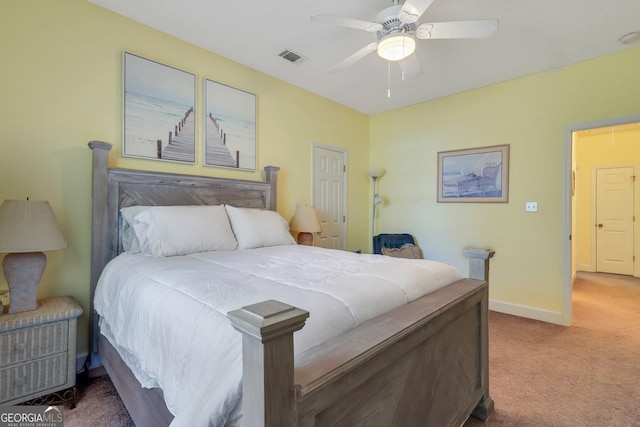 bedroom featuring a ceiling fan, light carpet, baseboards, and visible vents